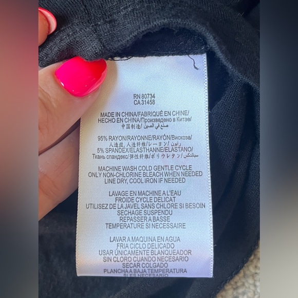 BCBGeneration Short Black Criss-Cross Back Dress Size S | Pockets | Gently Worn - Picture 6 of 7